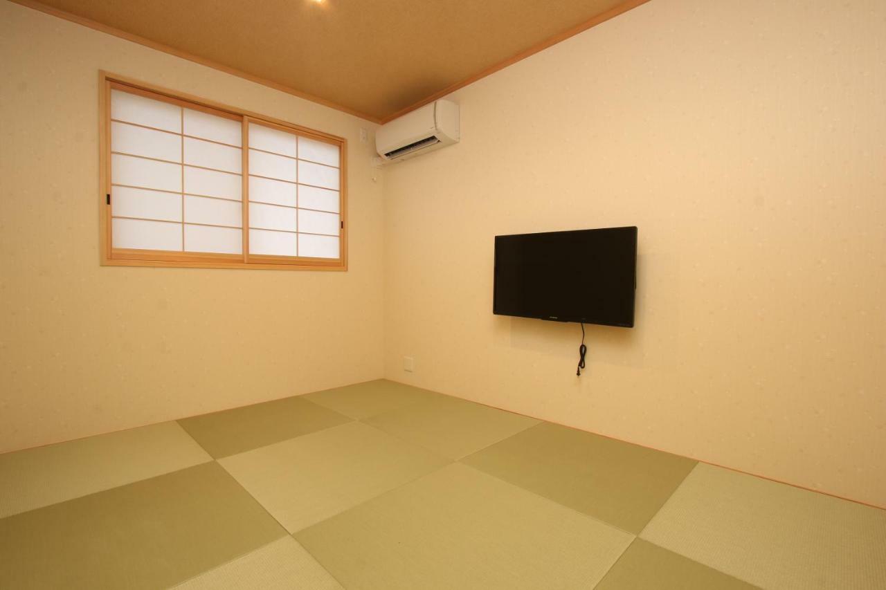 Отель Hitoyoshi Onsen Ohgano Yado Экстерьер фото