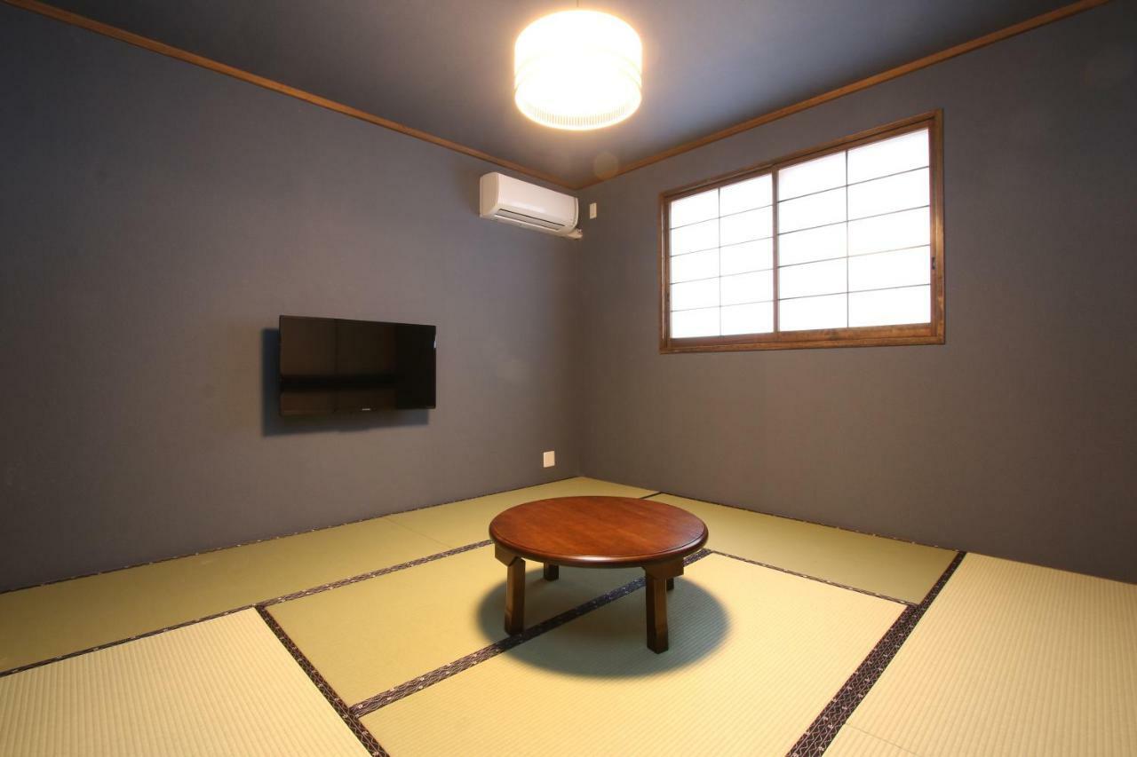 Отель Hitoyoshi Onsen Ohgano Yado Экстерьер фото